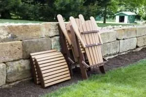 Comfo Back Folding Adirondack Chair and Folding Footstool - Cedar on Chocolate Brown (folded)